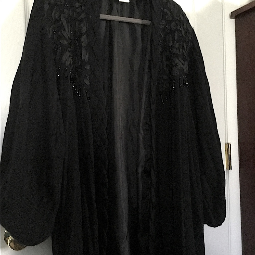 SWING SWEATER COAT. VERY UNIQUE